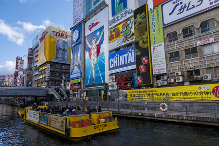 Osaka, Japan - December 30, 2018: Dotonbori the famous place in Osaka, Japan.Tourist walking in night shopping street at Dotonbori, the famous destination for traveller in Osaka, Japanのeditorial素材