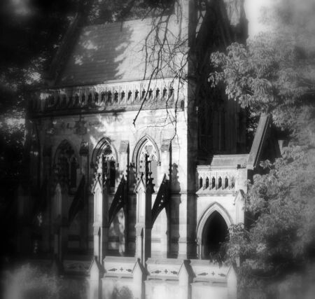 spooky Gothic crypt on secluded graveyard roadの写真素材