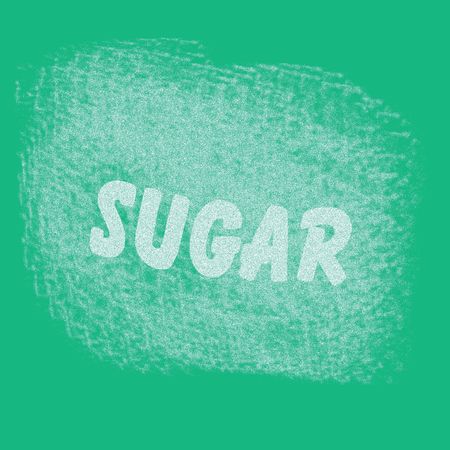 white sugar scattered on teal background illustrated signの写真素材