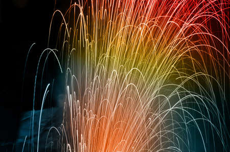 Colorful fireworks of celebration on the dark backgroundの写真素材