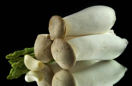 Mushrooms, garlic and asparagusの写真素材