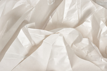 Layers of crumpled wax paper. Craft, handmade, art background. Text space