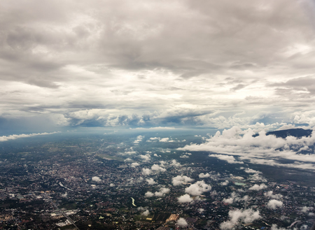Top view of Southern Thailand through clouds. Travel concept. Text spaceの写真素材
