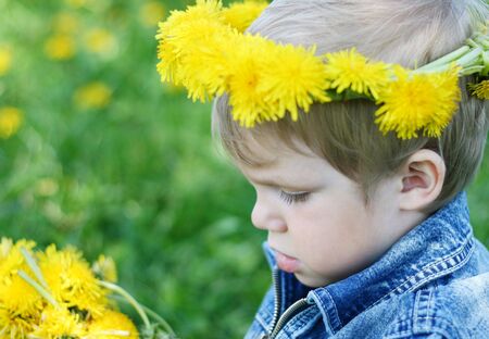 Portrait of pretty little boy with diademの写真素材
