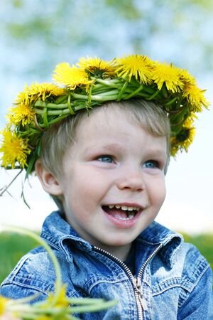 Happy little boy with diademの写真素材
