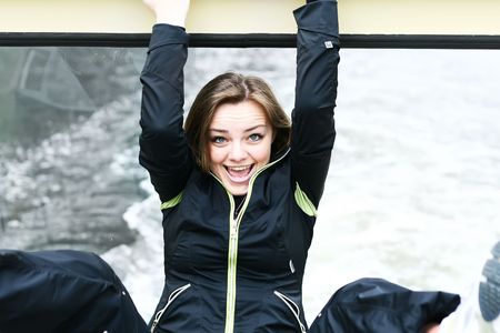 Funny girl with hadds upの写真素材