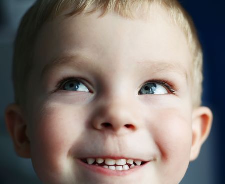 Very funny little kid look upの写真素材