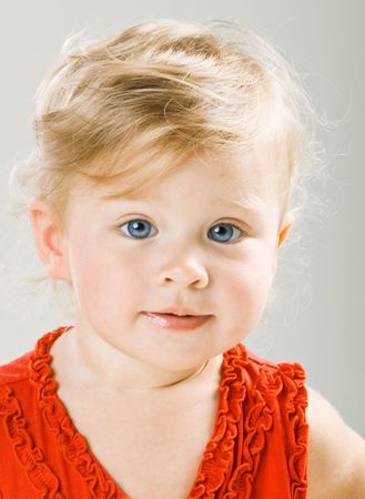 Closeup portrait of beautiful baby girlの写真素材