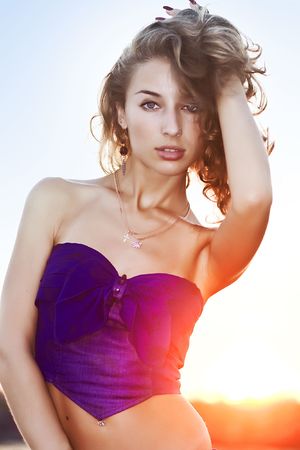 Portrait of beautiful young woman in sunlight