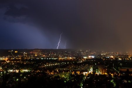 lightning storm over cityの写真素材