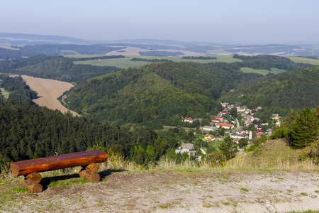Mountain landscape and empty benchの写真素材