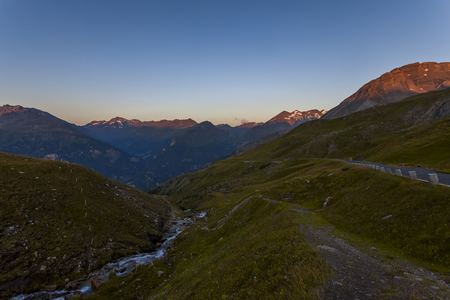 Dangerous and winding road in the high mountainsの写真素材