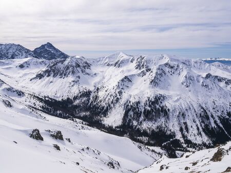 Snow in the  high mountainsの写真素材