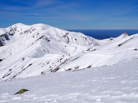 Snow in the  high mountainsの写真素材