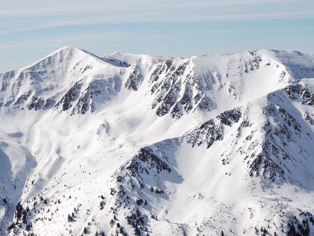Snow in the  high mountainsの写真素材