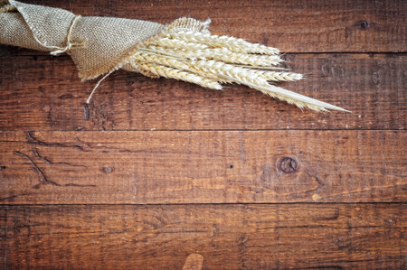 wheat in the mug  on the wooden background