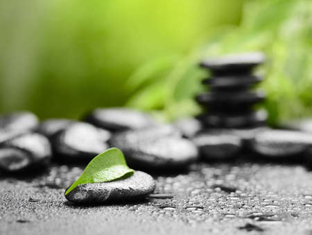 zen basalt stones and bamboo on the woodの写真素材
