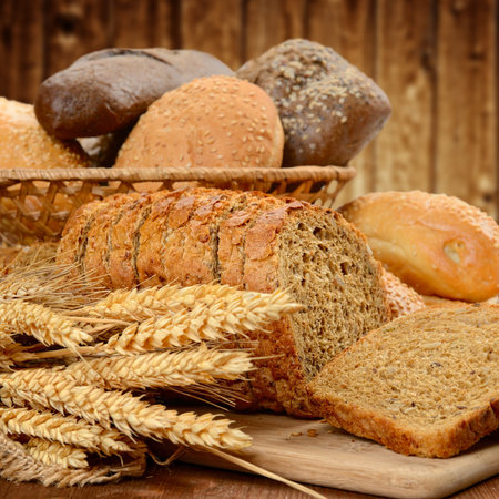 fresh bread  and wheat on the wooden