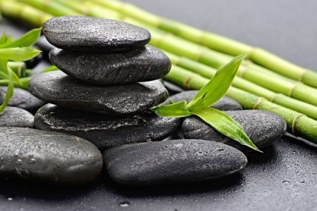 zen basalt stones and bamboo on the blackの写真素材