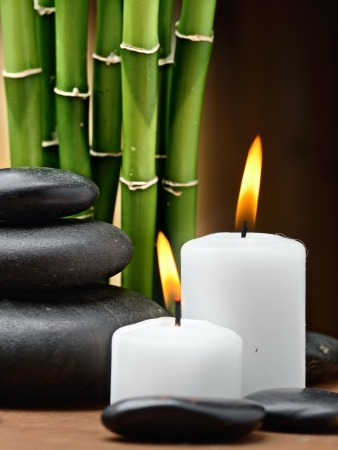 zen basalt stones and spa oil on the woodの写真素材