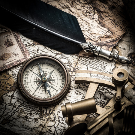 vintage  still life with compass,sextant and old mapの写真素材