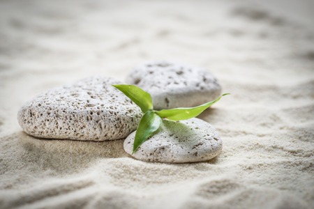 zen  stones and bamboo on the sandの写真素材
