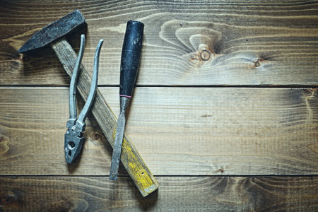 old tools on wooden background