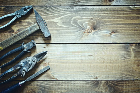 old tools on wooden backgroundの写真素材