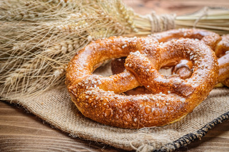 fresh bread  and wheat on the wooden