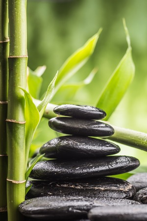 still life with zen basalt stones and bambooの写真素材