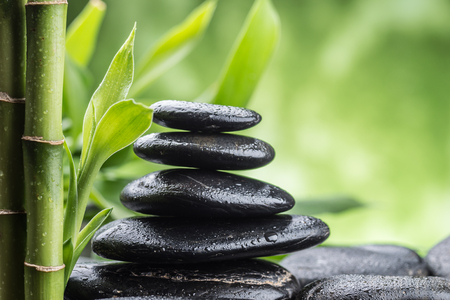 still life with zen basalt stones and bambooの写真素材