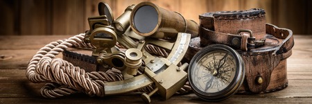 vintage still life with compass,sextant and spyglassの写真素材