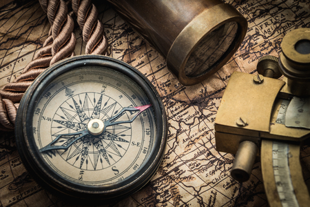 vintage still life with compass,sextant and spyglassの写真素材
