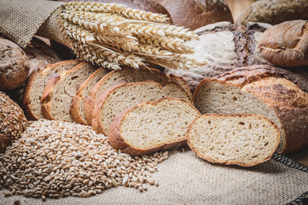 fresh bread and wheat on the wooden