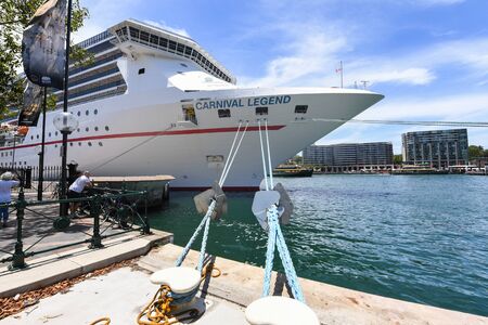 Sydney, Australia - December 09, 2018: The ocean cruise liner Carnival Legend is docked at the Overseas Passenger Terminal in Sydney Harbour, Circular Quay. - Imageのeditorial素材