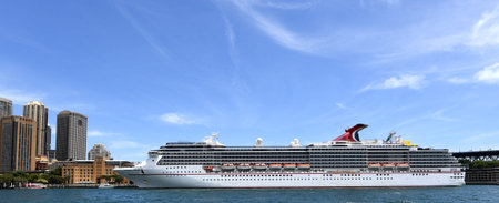 Sydney, Australia - December 09, 2018: The ocean cruise liner Carnival Legend is docked at the Overseas Passenger Terminal in Sydney Harbour, Circular Quay. - Imageのeditorial素材