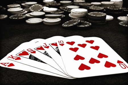 Poker suit Royal Flush of hearts with depth of field poker chips in background , 300 D.P.I の写真素材