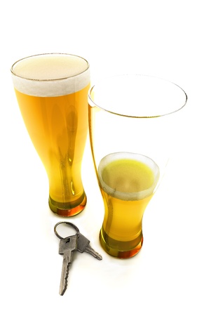 One and a half beers with car keys isolated on a white background, 300 D.P.I の写真素材