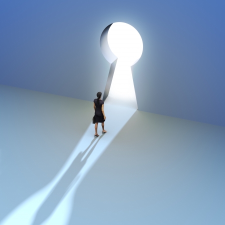 Key to success, Female walking to the entrance of a keyhole の写真素材