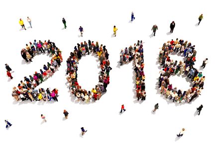 Bringing in the new year. Large group of people forming the shape of 2018 celebrating a new year concept on a white background. 3d renderingの写真素材