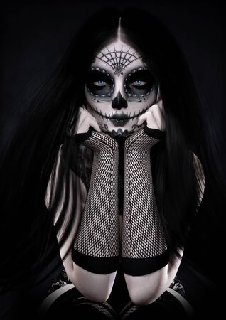 Portrait of a sitting blue eyed female wearing sugar skull style make up with long black hair and dressed with Gothic accents. 3d renderingの写真素材