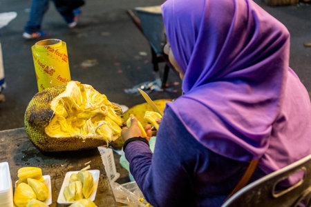 Cutting Jackfruit at local street market