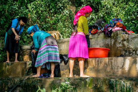 Dong Van (Ha Giang) Vietnam - Trekking, women cleaning clothesのeditorial素材