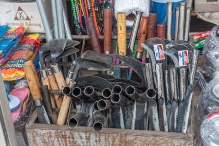 Knives and blades for sale at rural market in Thailandのeditorial素材