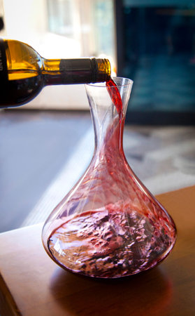 Decanting a fine red wine in a restaurant