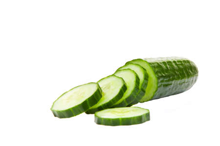 Sliced cucumber with shallow depth of field, focus point in middle of slices, shot on white background の写真素材