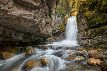 Lot's of little waterfalls on the trail above Troll Falls.の写真素材