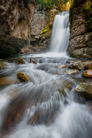 There is a great series of little streams and waterfalls above the popular Troll Falls in Kananaskis Alberta.の写真素材