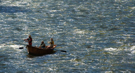Three men fishing and boating on the Colorado River.のeditorial素材