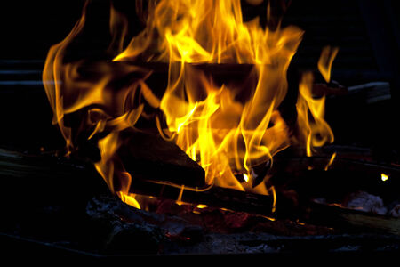A campfire burning in the night.の写真素材